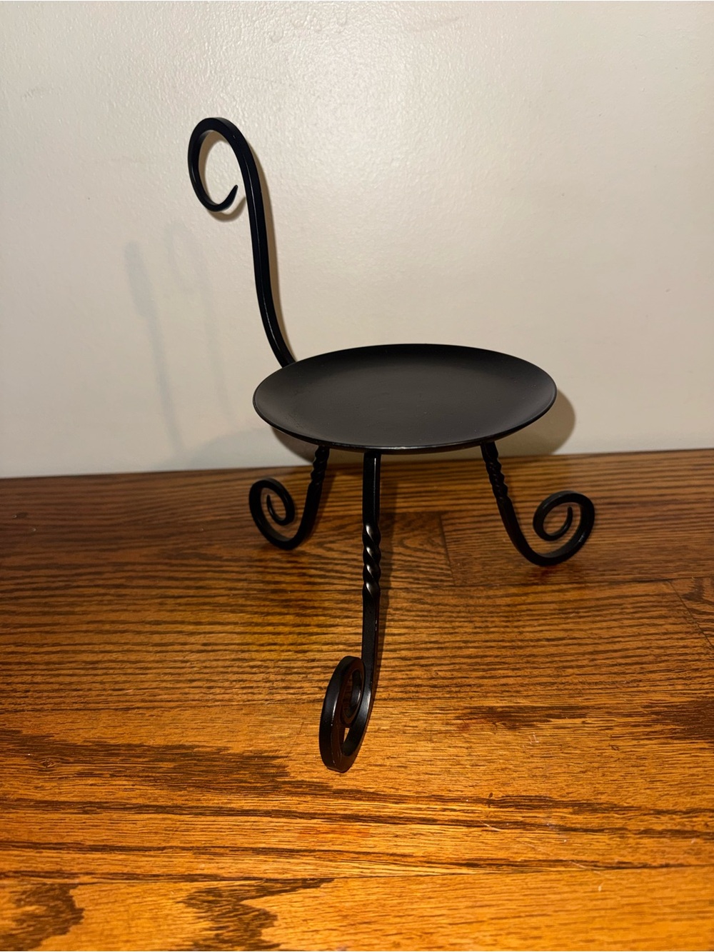 Black black wrought iron 3-legged pillar candle holder